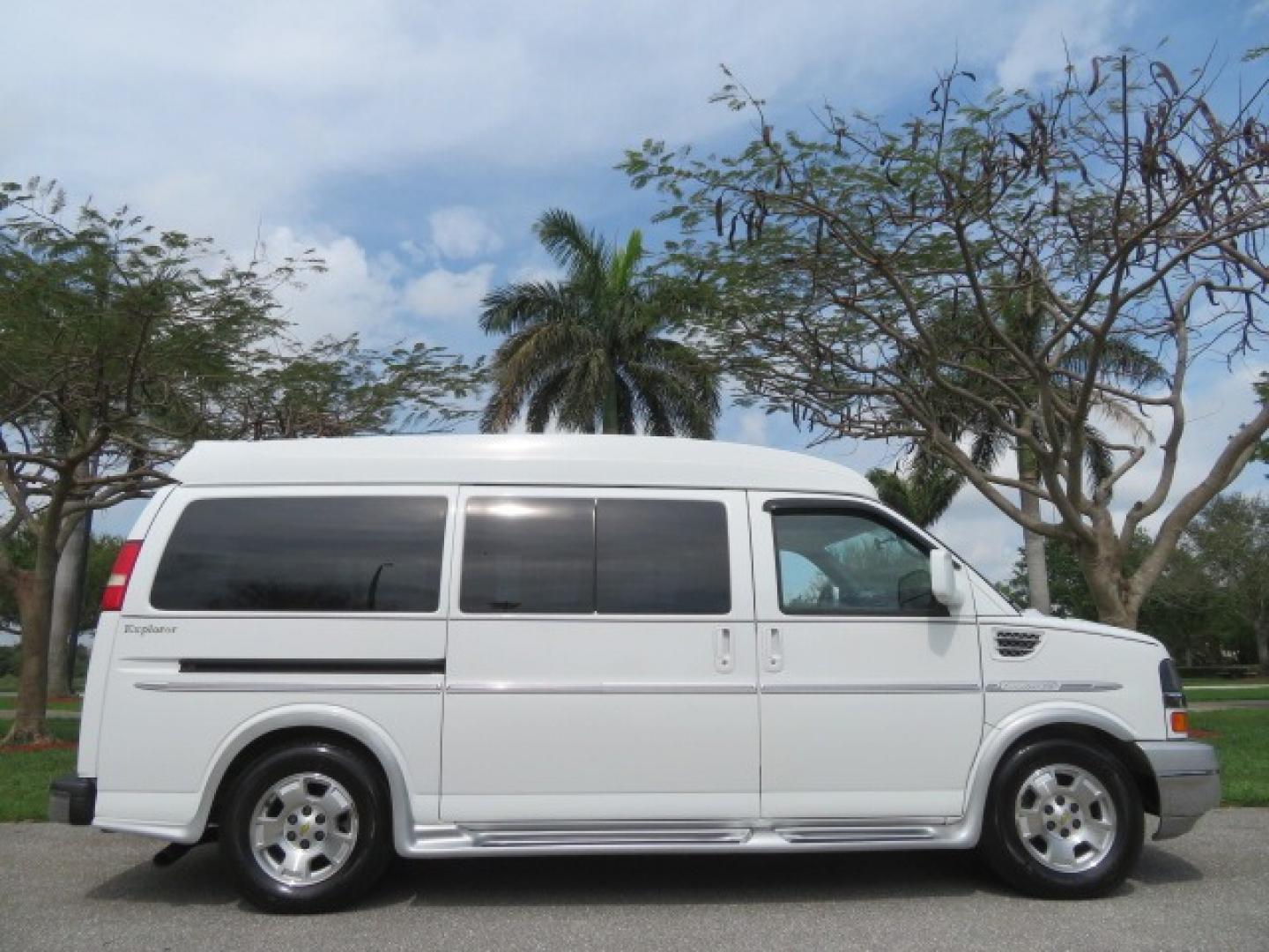 2010 White /Gray Chevrolet Express (1GNUGCD48A1) , located at 4301 Oak Circle #19, Boca Raton, FL, 33431, (954) 561-2499, 26.388861, -80.084038 - You are looking at a Gorgeous 2010 Chevy Express Handicap Wheelchair Conversion Van Explorer Limited SE with 31K Original Miles, Braun Century 750lb Side Entry Wheelchair lift, Tie Down System in the Floor, Rear Entertainment with Flat Screen TV/DVD, Leather Interior, Rear Power Folding Bench Seat/b - Photo#4